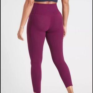 Athleta salutation stash pocket 7/8 LP large petit